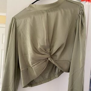 Green long sleeve top.